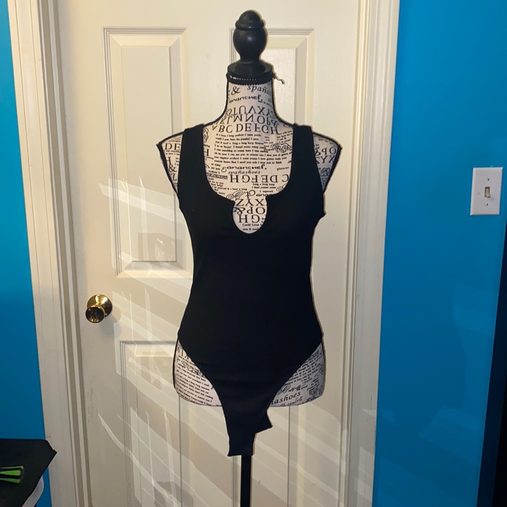 Women’s black sleeveless body suit